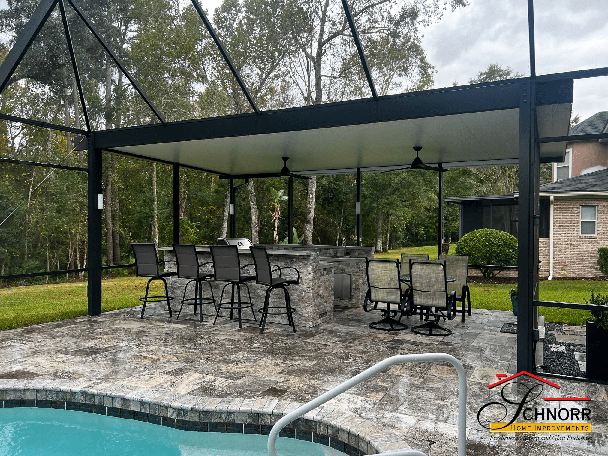 Covered Outdoor Kitchen in Jacksonville FL Covered outdoor kitchen with counter space and seating at a Jacksonville, FL home