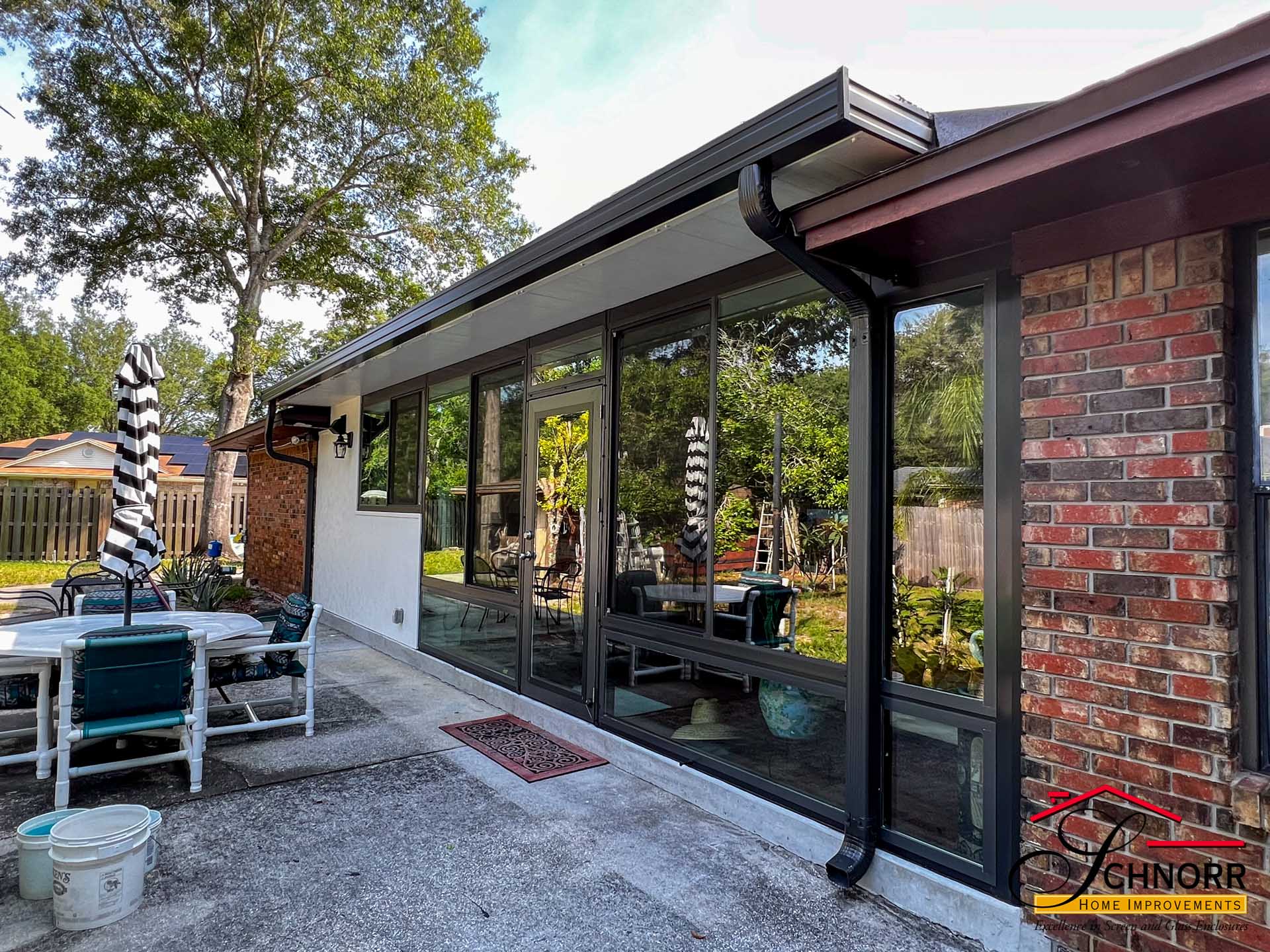 Patio to Sunroom Conversion Jacksonville FL Patio converted into a custom sunroom by Schnorr Home Improvements in Jacksonville, FL