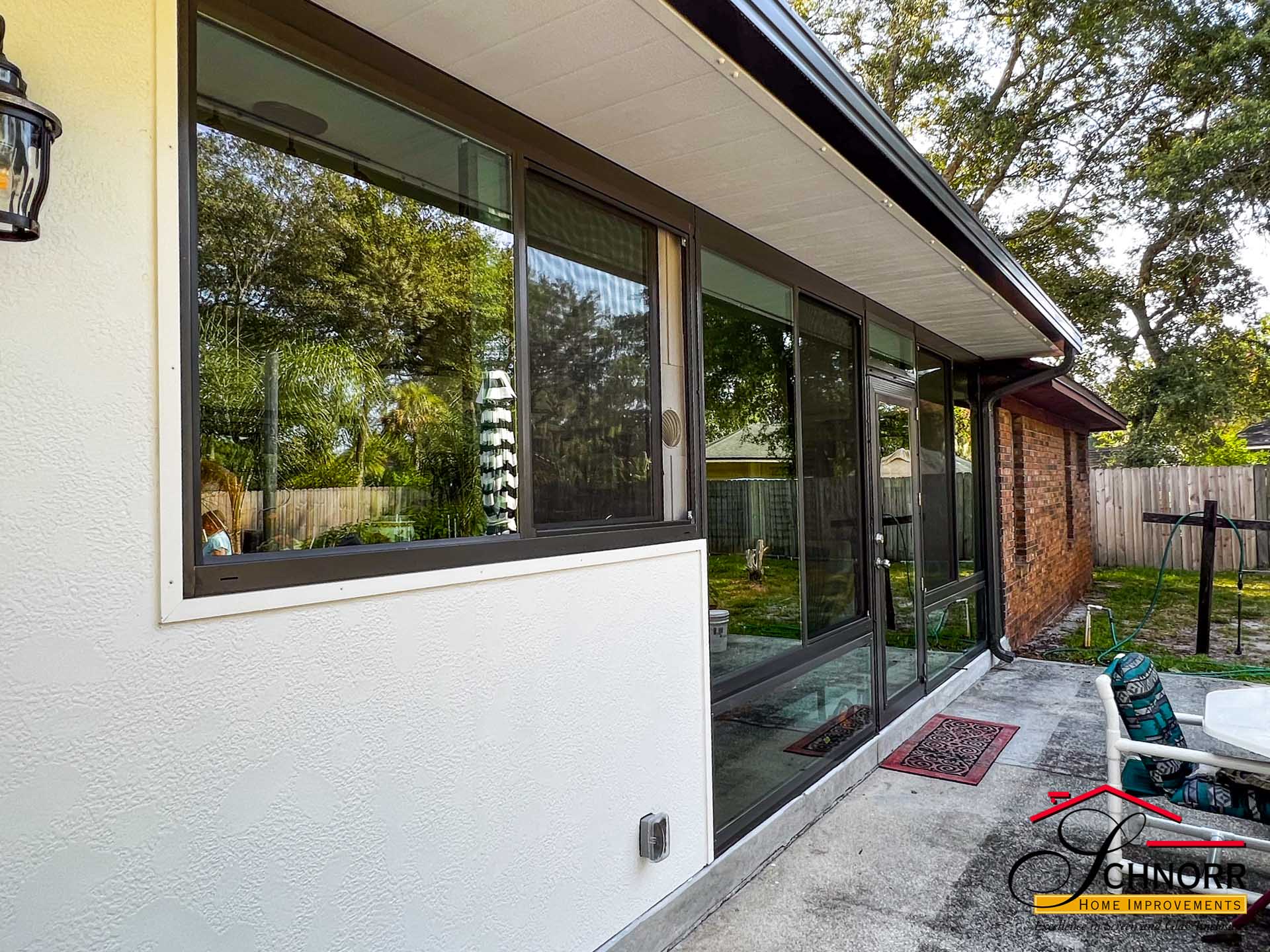 Custom Patio to Sunroom Conversion Residential patio converted into a custom enclosed sunroom by Schnorr Home Improvements.